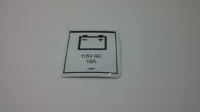 DECAL, LABEL, PWR TO CHARGER 115 UK