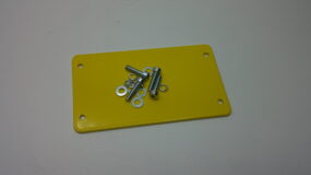Overhead proximity sensor blanking plate